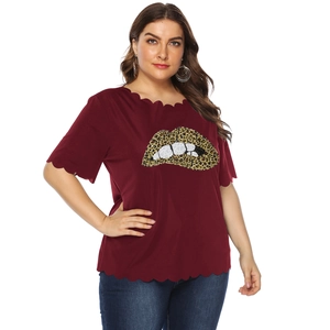 Plus size short sleeve top in wine red with leopard lip print and scalloped edges
