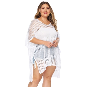 Detailed knit texture and side slit of this white oversized crochet beach cover-up
