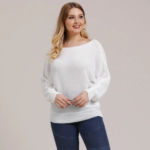 Close-up of white knitted texture and round neckline of a batwing sleeve sweater
