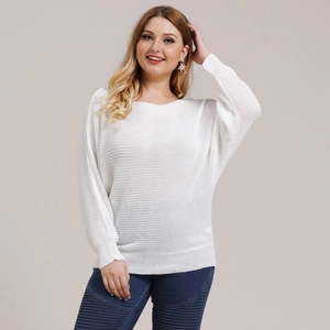 Detailed knit texture of white batwing sleeve sweater with loose round neck design