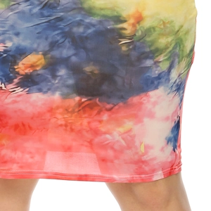 Detailed view of colorful tie-dye print and fine stitching on a slim-fit dress hem