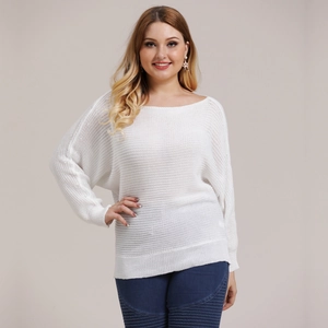 Detail of white hollow knit texture and batwing sleeve design on loose sweater