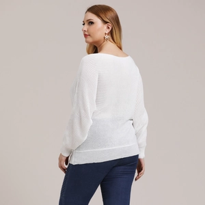 Side view of white oversized knit sweater with hollow weave texture and batwing sleeves