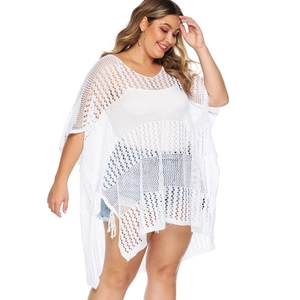 Plus size white hollow crochet beach cover-up with V-neck and loose batwing sleeves