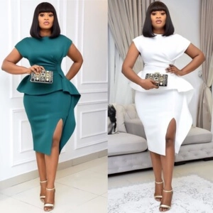 Detail of waist peplum and side slit on an elegant V-neck midi dress for women