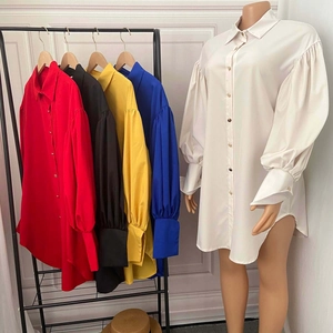 Detail view of puff sleeve shirt dresses in various colors with irregular hemline