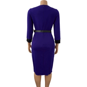 Detail view of royal blue bodycon dress with black cuffs and back zipper closure