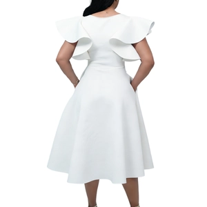 Rear view of white A-line dress featuring ruffle butterfly sleeves and side pockets
