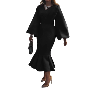 Detail showing elegant V-neckline and voluminous lantern sleeves on black mermaid dress
