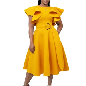 Detail of yellow cocktail dress featuring elegant ruffle sleeves and amber waist buckle
