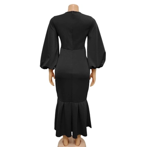Back view of black V-neck long sleeve mermaid dress with ruffle hem and lantern sleeves