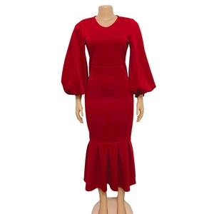 Detailed front view of red V-neck maxi dress with long puff sleeves and mermaid hemline