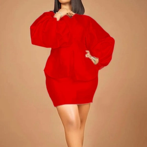 Detailed view of red puff sleeve top with V-neck and peplum waist fashion set