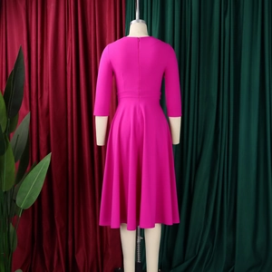 Detail view of fuchsia square neck dress with pleated high waist and A-line skirt