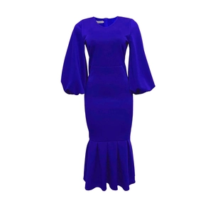 Detail of royal blue V-neck dress with lantern sleeves and ruffled fishtail hem