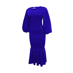 Close-up of deep blue V-neck dress featuring puff sleeves and fishtail hem detail