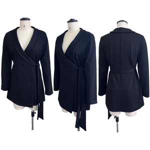 Detailed front, side and back view of a black wrap blazer dress with waist tie belt