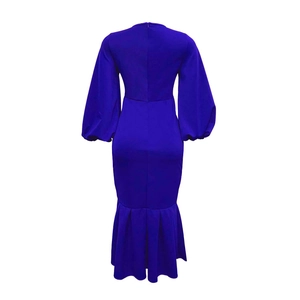 Rear view of royal blue V-neck fishtail dress with puff sleeves and zipper detail