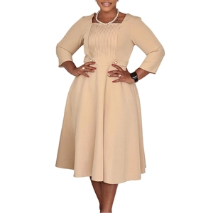 Detailed square neck and vertical pleats with pearl buckle on khaki dress