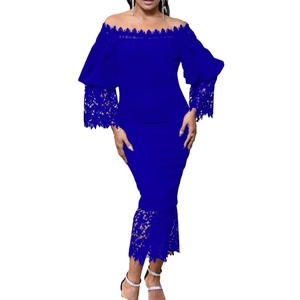 Close-up of royal blue off-shoulder dress with intricate floral lace sleeves and hem detail