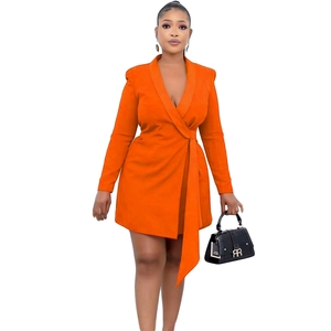Slim-fit orange wrap blazer dress for women featuring side tie and notched lapels