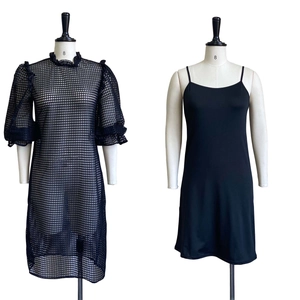 Detailed display of black mesh puff sleeve top and camisole dress two-piece set