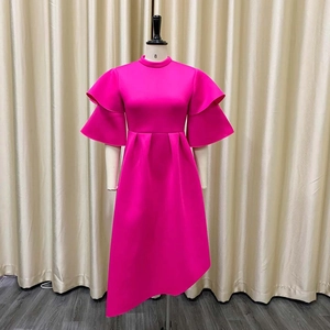 Detail of rose red dress with double layer ruffle sleeves and pleated waist design