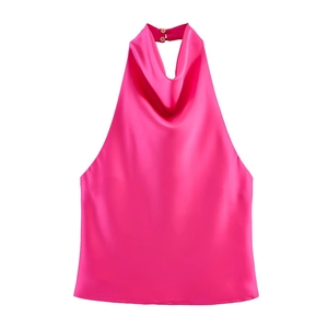 Detail view of glossy satin halter top with elegant cowl neck and button closure