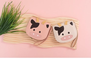 Cute cow pattern PU leather small coin purses in pink and beige with wrist straps