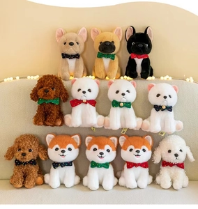 Detailed close-up showing soft plush texture and cute bowties of various puppy figures