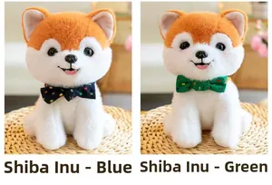 Detail of cute Shiba Inu plushies wearing blue and green polka dot bowties in a cozy home setting