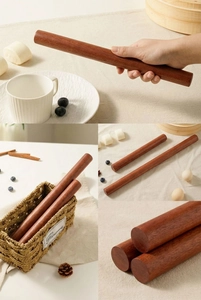 Macro detail of high-quality ebony wood rolling pin with natural wood grain texture
