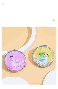 Detail of round folding mirrors with glitter sand finish and protective edges