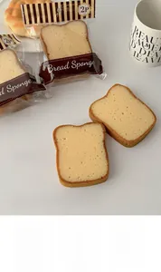 Detail of toast-shaped dishwashing sponges showing realistic bread slice texture