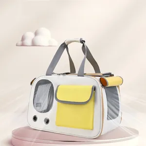 Detail of the breathable mesh and yellow pocket on the white pet travel backpack
