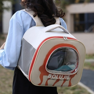 Detail of breathable pet backpack showing semi-sphere window and side mesh