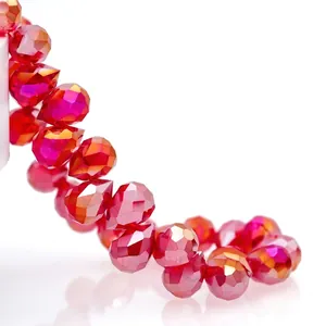 Macro shot of red faceted K9 crystal teardrop beads with brilliant sparkling finish