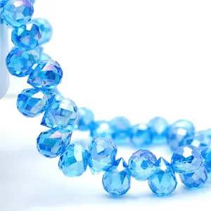 Detail of faceted royal blue K9 crystal glass teardrop beads for jewelry making