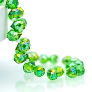 Sparkling green faceted teardrop crystal glass beads with rainbow shimmer for DIY jewelry