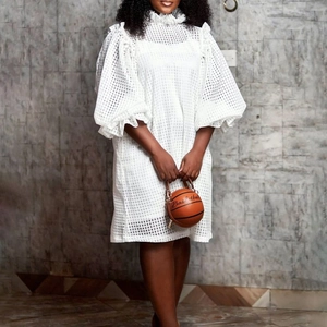 White mesh hollow out dress with puff sleeves and orange basketball handbag