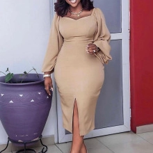 Detail of khaki midi dress featuring a sweetheart neckline and elegant puff sleeves