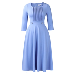 Detail of square neckline with vertical pleats on a light blue high-waist dress