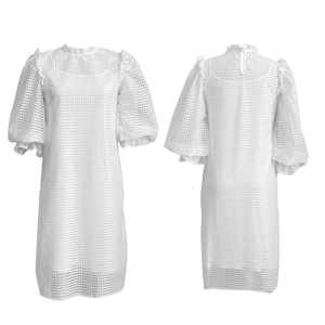 Detail view of white mesh hollow dress with puff sleeves and ruffled high neck collar
