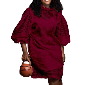 Detail of wine red dress featuring ruffled stand collar and voluminous puff lantern sleeves