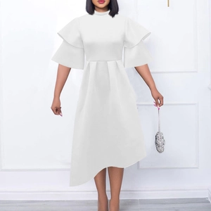 Elegant white mock neck dress with ruffled bell sleeves and asymmetric flowing hem