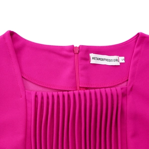 Detail of square neckline with vertical pleats and zipper on rose pink dress