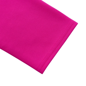Macro shot of rose red dress fabric with durable double-needle stitching on the hem