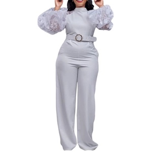Elegant light gray high neck jumpsuit with white lace puff sleeves and floral embroidery