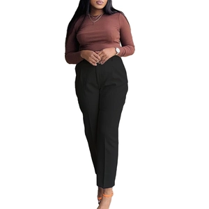 Detail shot of black high waist straight suit trousers with pleated front and smooth drape