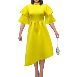 Detail of yellow midi dress with double layered ruffle sleeves and pleated waist design